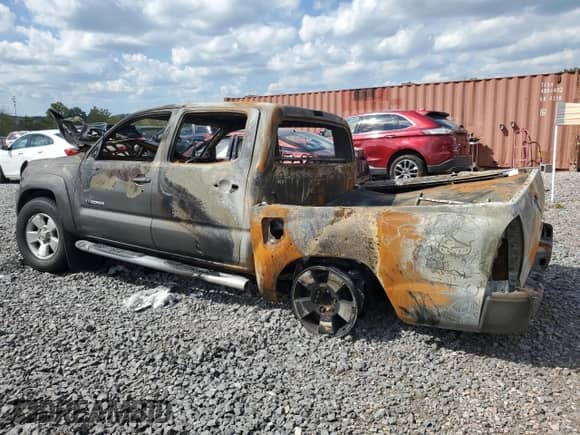 2009 Toyota Tacoma PreRunner с VIN 3TMJU62NX9M083631, выставлен на аукционе Copart как лот 86092535 с пробегом Не указан миль и Списание • Salvage title. История ставок и продаж доступна на DreamBid. Изображение 2.