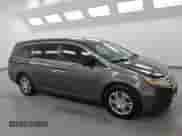 2013 Honda Odyssey EX-L z VIN 5FNRL5H68DB084399, wystawiony jako Copart lot #71293185 z przebiegiem 210 097 mil mil oraz Czysty tytuł • Clean title. Historia ofert i sprzedaży dostępna na DreamBid. Obrazek 4.