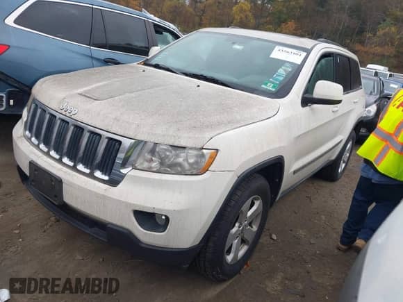 2012 Jeep Grand Cherokee Laredo z VIN 1C4RJFAG2CC248790, wystawiony jako IAAI lot #43563104 z przebiegiem 162 187 mil mil oraz . Historia ofert i sprzedaży dostępna na DreamBid. Obrazek 2.