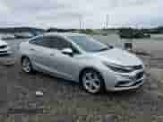 2018 Chevrolet Cruze Premier с VIN 1G1BF5SM3J7169337, выставлен на аукционе Copart как лот 70849305 с пробегом 166 361 миль миль и Списание • Salvage title. История ставок и продаж доступна на DreamBid. Изображение 4.