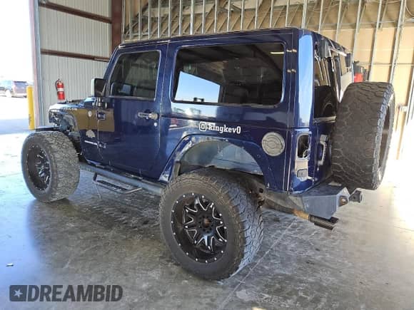2013 Jeep Wrangler Rubicon with VIN 1C4BJWCG5DL512584, listed as a Copart auction lot 85975154 with 185,480 mi miles and Clean title. Bid and sale history available at DreamBid. Image 2.