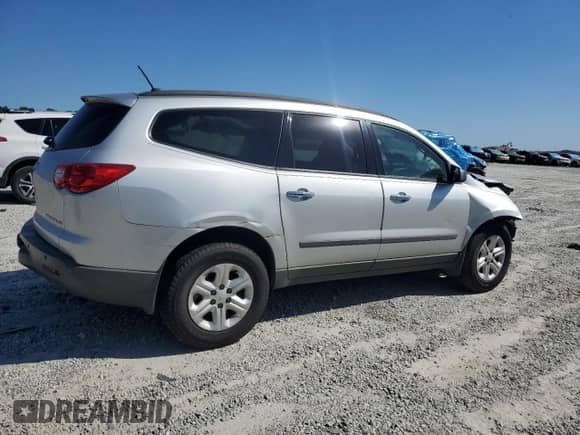 2012 Chevrolet Traverse LS с VIN 1GNKRFED0CJ157918, выставлен на аукционе Copart как лот 84815535 с пробегом Не указан миль и Списание • Salvage title. История ставок и продаж доступна на DreamBid. Изображение 3.