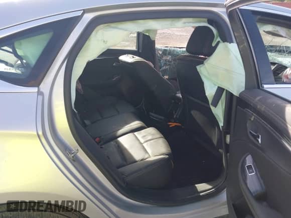 2018 Chevrolet Impala Premier z VIN 2G1125S3XJ9173740, wystawiony jako IAAI lot #43014022 z przebiegiem 95 383 mil mil oraz . Historia ofert i sprzedaży dostępna na DreamBid. Obrazek 8.
