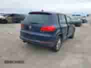2014 Volkswagen Tiguan S с VIN WVGAV3AX0EW561155, выставлен на аукционе IAAI как лот 41362832 с пробегом 65 399 миль миль и . История ставок и продаж доступна на DreamBid. Изображение 4.