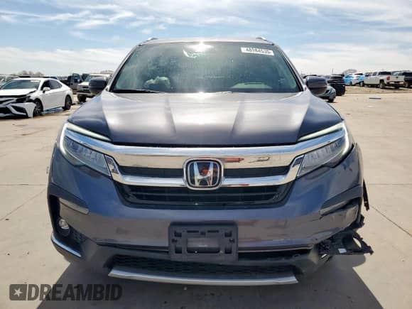 2021 Honda Pilot Touring 7-Passenger с VIN 5FNYF5H60MB014706, выставлен на аукционе Copart как лот 48984535 с пробегом 57 923 миль миль и Чистый • Clean title. История ставок и продаж доступна на DreamBid. Изображение 5.