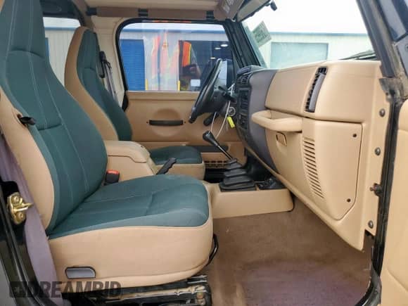 2002 Jeep Wrangler Sahara с VIN 1J4FA59S22P776143, выставлен на аукционе Copart как лот 60609955 с пробегом 80 675 миль миль и Списание • Salvage title. История ставок и продаж доступна на DreamBid. Изображение 11.