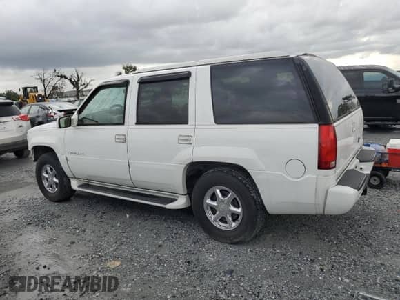 2000 Cadillac Escalade with VIN 1GYEK13R4YR164899, listed as a Copart auction lot 69925155 with 197,475 mi miles and Salvage title. Bid and sale history available at DreamBid. Image 2.