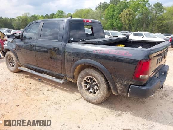 2018 Ram 1500 Rebel with VIN 1C6RR7YT4JS151036, listed as a IAAI auction lot 41988370 with 72,587 mi miles and . Bid and sale history available at DreamBid. Image 3.