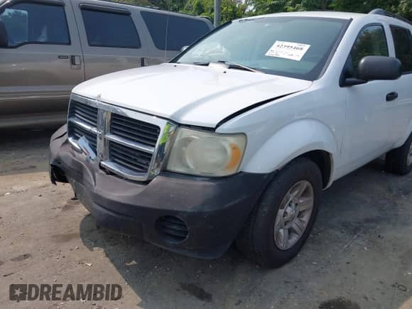 2007 Dodge Durango SXT z VIN 1D8HB38P57F568317, wystawiony jako IAAI lot #42395468 z przebiegiem 236 924 mil mil oraz . Historia ofert i sprzedaży dostępna na DreamBid. Obrazek 12.