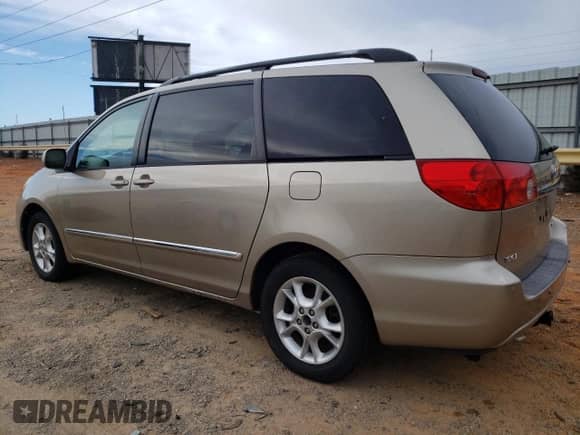 2006 Toyota Sienna XLE z VIN 5TDBA22C86S056444, wystawiony jako Copart lot #80984965 z przebiegiem 242 168 mil mil oraz Czysty tytuł • Clean title. Historia ofert i sprzedaży dostępna na DreamBid. Obrazek 2.