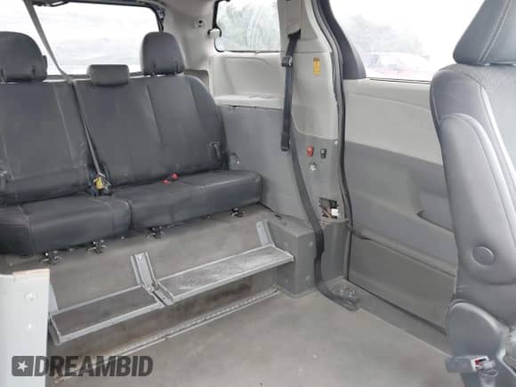2014 Toyota Sienna SE with VIN 5TDXK3DC6ES421515, listed as a IAAI auction lot 43102179 with 63,756 mi miles and . Bid and sale history available at DreamBid. Image 8.