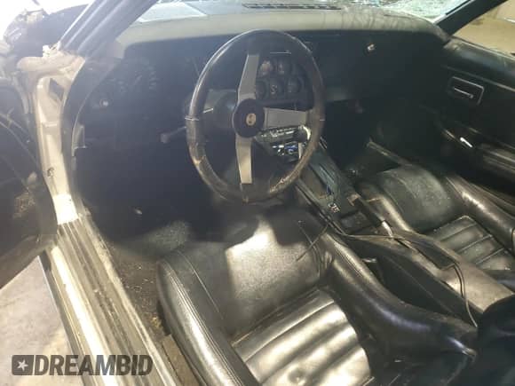 1979 Chevrolet Corvette с VIN 1Z8789S406567, выставлен на аукционе Copart как лот 43365335 с пробегом 90 615 миль миль и Списание • Salvage title. История ставок и продаж доступна на DreamBid. Изображение 8.