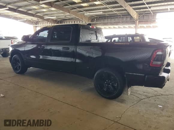 2024 Ram 1500 Big Horn with VIN 1C6SRFMT3RN156532, listed as a Copart auction lot 62190795 with 27,215 mi miles and Salvage title. Bid and sale history available at DreamBid. Image 2.