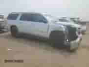 2019 Chevrolet Suburban Premier with VIN 1GNSKJKJ8KR184012, listed as a Copart auction lot 67374625 with 128,893 mi miles and Salvage title. Bid and sale history available at DreamBid. Image 4.