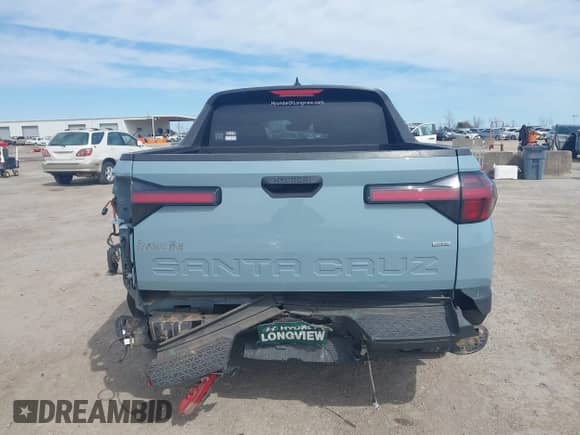 2023 Hyundai Santa Cruz SEL with VIN 5NTJBDAE3PH066962, listed as a IAAI auction lot 41688181 with 47,465 mi miles and . Bid and sale history available at DreamBid. Image 16.