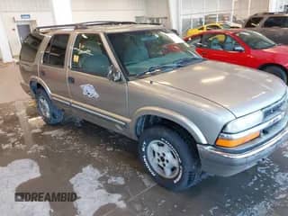 2001 Chevrolet Blazer LT z VIN 1GNDT13WX12201416, wystawiony jako IAAI lot #41307116 z przebiegiem 244 058 mil mil oraz . Historia ofert i sprzedaży dostępna na DreamBid. Obrazek 1.