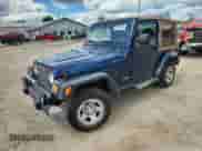 2003 Jeep Wrangler X z VIN 1J4FA39S33P356428, wystawiony jako Copart lot #70285135 z przebiegiem 147 788 mil mil oraz Szkoda całkowita • Salvage title. Historia ofert i sprzedaży dostępna na DreamBid. Obrazek 1.