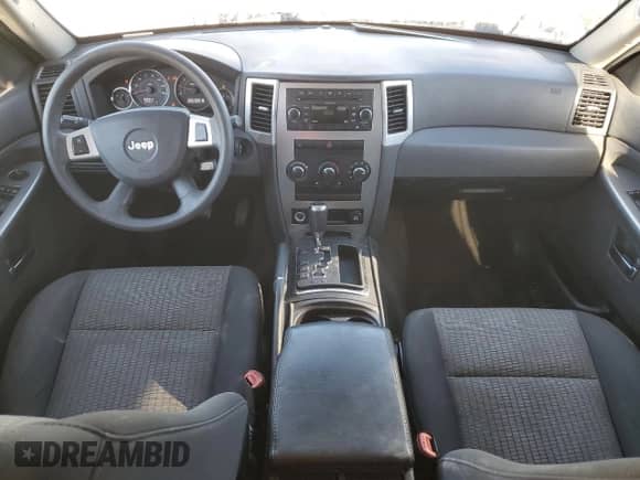 2009 Jeep Grand Cherokee Rocky Mountain с VIN 1J8GR48K69C527904, выставлен на аукционе Copart как лот 82417995 с пробегом 149 691 миль миль и Списание • Salvage title. История ставок и продаж доступна на DreamBid. Изображение 8.