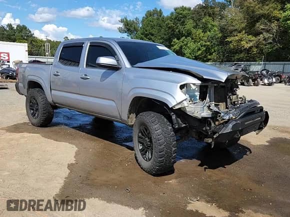 2020 Toyota Tacoma SR5 z VIN 3TMCZ5AN1LM311240, wystawiony jako Copart lot #85188965 z przebiegiem 149 027 mil mil oraz Szkoda całkowita • Salvage title. Historia ofert i sprzedaży dostępna na DreamBid. Obrazek 12.