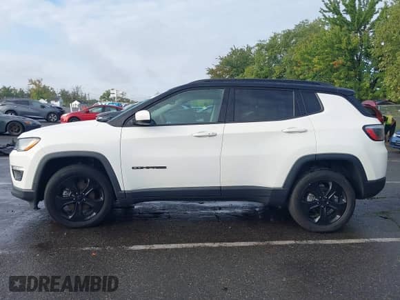 2021 Jeep Compass Altitude with VIN 3C4NJDBB6MT586270, listed as a IAAI auction lot 43250792 with 62,538 mi miles and . Bid and sale history available at DreamBid. Image 14.