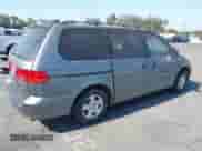 2000 Honda Odyssey EX with VIN 2HKRL186XYH593393, listed as a IAAI auction lot 42877242 with 164,593 mi miles and . Bid and sale history available at DreamBid. Image 4.