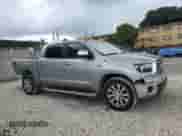 2010 Toyota Tundra Limited z VIN 5TFFY5F15AX098600, wystawiony jako Copart lot #66905195 z przebiegiem 205 694 mil mil oraz Szkoda całkowita • Salvage title. Historia ofert i sprzedaży dostępna na DreamBid. Obrazek 4.