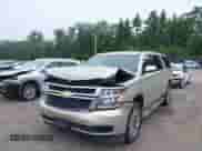 2015 Chevrolet Suburban LT with VIN 1GNSKJKC5FR569101, listed as a IAAI auction lot 42631110 with 183,729 mi miles and . Bid and sale history available at DreamBid. Image 2.