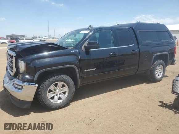 2019 GMC Sierra 1500 SLE with VIN 2GTV2MECXK1127002, listed as a Copart auction lot 61127735 with 63,923 mi miles and Salvage title. Bid and sale history available at DreamBid. Image 1.