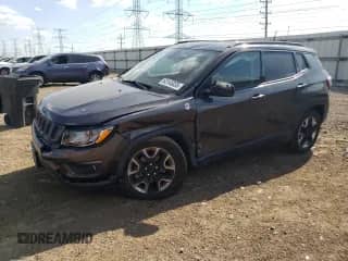 2017 Jeep Compass Trailhawk with VIN 3C4NJDDB5HT657784, listed as a Copart auction lot 63145835 with 82,022 mi miles and Salvage title. Bid and sale history available at DreamBid. Image 1.