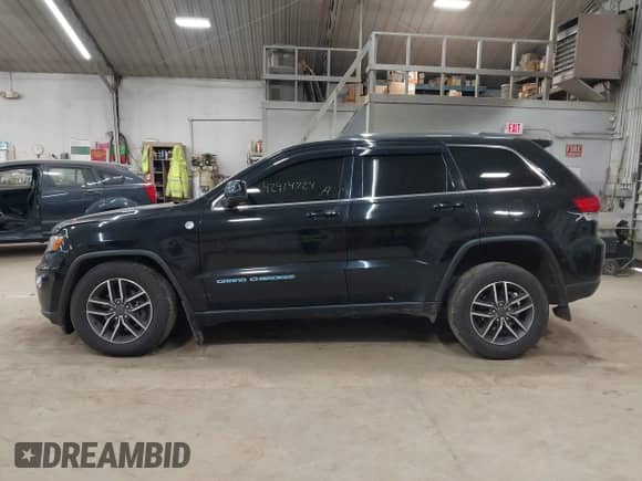 2020 Jeep Grand Cherokee Altitude with VIN 1C4RJFAG7LC383232, listed as a IAAI auction lot 42914724 with 99,821 mi miles and . Bid and sale history available at DreamBid. Image 14.