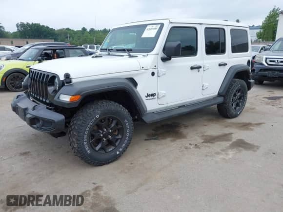 2022 Jeep Wrangler Unlimited Sport S с VIN 1C4HJXDG5NW156250, выставлен на аукционе IAAI как лот 42601680 с пробегом 56 083 миль миль и . История ставок и продаж доступна на DreamBid. Изображение 2.