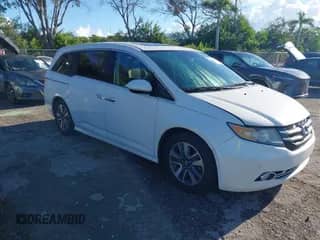 2015 Honda Odyssey Touring Elite с VIN 5FNRL5H98FB082309, выставлен на аукционе IAAI как лот 43242512 с пробегом 210 231 миль миль и . История ставок и продаж доступна на DreamBid. Изображение 1.