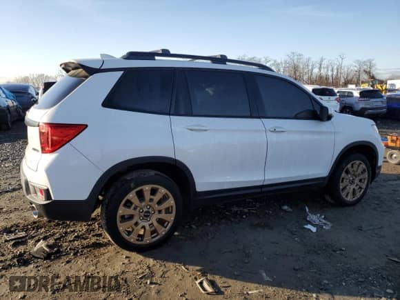 2023 Honda Passport EX-L с VIN 5FNYF8H57PB016515, выставлен на аукционе Copart как лот 83520014 с пробегом Не указан миль и Списание • Salvage title. История ставок и продаж доступна на DreamBid. Изображение 3.