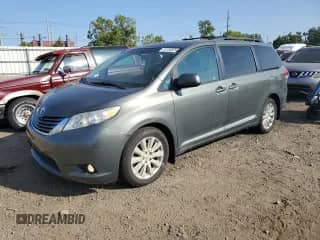 2012 Toyota Sienna XLE with VIN 5TDDK3DC2CS042995, listed as a Copart auction lot 81154875 with 241,918 mi miles and Clean title. Bid and sale history available at DreamBid. Image 1.