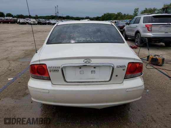 2004 Hyundai Sonata with VIN KMHWF25H74A041613, listed as a Copart auction lot 58448225 with 175,768 mi miles and Salvage title. Bid and sale history available at DreamBid. Image 6.