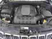 2018 Jeep Grand Cherokee Sterling with VIN 1C4RJFBT5JC121010, listed as a Copart auction lot 84887054 with 96,528 mi miles and Salvage title. Bid and sale history available at DreamBid. Image 12.