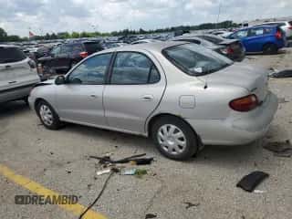 1997 Hyundai Elantra с VIN KMHJF24M9VU540731, выставлен на аукционе Copart как лот 63684645 с пробегом Не указан миль и Списание • Salvage title. История ставок и продаж доступна на DreamBid. Изображение 2.
