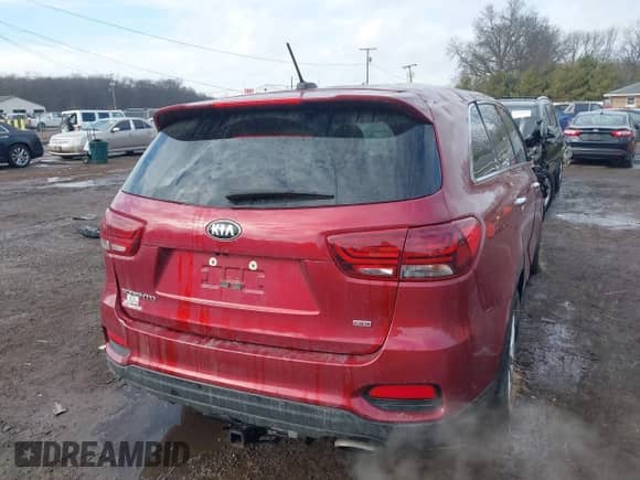 2020 Kia Sorento L with VIN 5XYPG4A32LG676233, listed as a IAAI auction lot 41521224 with 67,440 mi miles and . Bid and sale history available at DreamBid. Image 4.