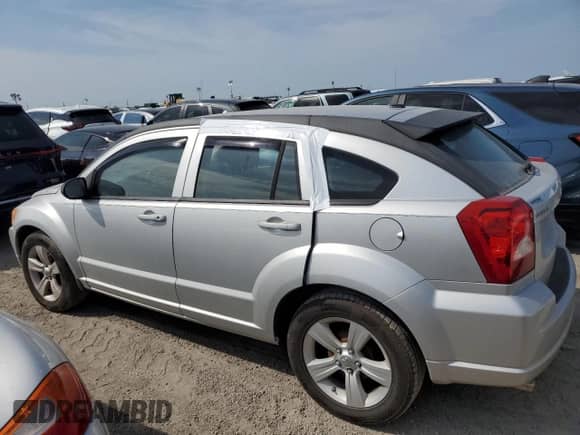 2011 Dodge Caliber Mainstreet с VIN 1B3CB3HA3BD116036, выставлен на аукционе Copart как лот 76590624 с пробегом Не указан миль и Списание • Salvage title. История ставок и продаж доступна на DreamBid. Изображение 2.