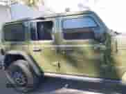 2022 Jeep Wrangler Unlimited Rubicon 392 with VIN 1C4JJXSJ5NW208332, listed as a IAAI auction lot 41517128 with Not provided miles and . Bid and sale history available at DreamBid. Image 14.