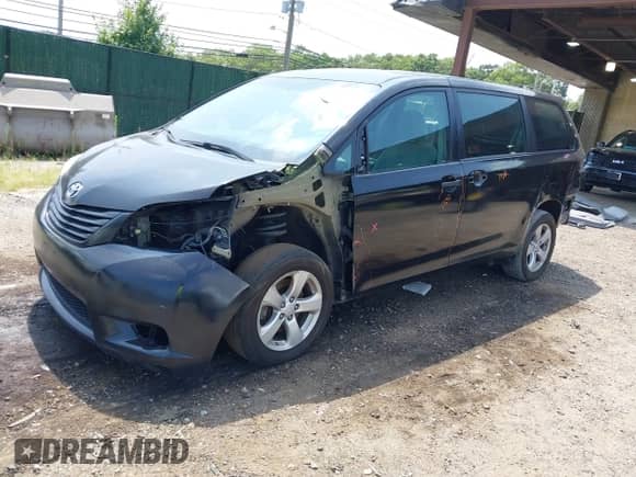 2014 Toyota Sienna L with VIN 5TDZK3DC8ES463757, listed as a IAAI auction lot 42915919 with 95,252 mi miles and . Bid and sale history available at DreamBid. Image 21.