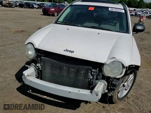 2007 Jeep Compass Sport with VIN 1J8FT47W07D107774, listed as a Copart auction lot 56740335 with 218,850 mi miles and Salvage title. Bid and sale history available at DreamBid. Image 13.