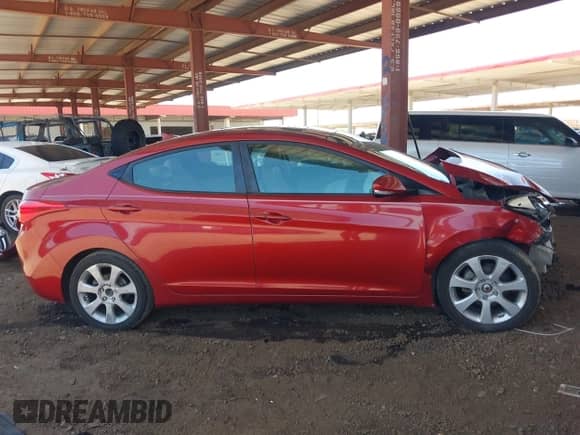 2012 Hyundai Elantra Limited z VIN KMHDH4AE0CU463972, wystawiony jako IAAI lot #42575211 z przebiegiem 112 977 mil mil oraz . Historia ofert i sprzedaży dostępna na DreamBid. Obrazek 14.