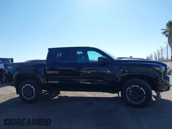 2024 Toyota Tacoma SR5 with VIN 3TMKB5FN3RM000779, listed as a IAAI auction lot 43081279 with 24,906 mi miles and . Bid and sale history available at DreamBid. Image 13.