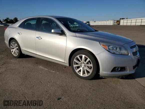 2013 Chevrolet Malibu LTZ с VIN 1G11H5SA3DF302765, выставлен на аукционе Copart как лот 81489615 с пробегом 99 196 миль миль и Списание • Salvage title. История ставок и продаж доступна на DreamBid. Изображение 4.
