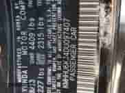 2013 Hyundai Genesis Coupe R-Spec with VIN KMHHU6KJ4DU097407, listed as a Copart auction lot 70995454 with 128,815 mi miles and Salvage title. Bid and sale history available at DreamBid. Image 13.