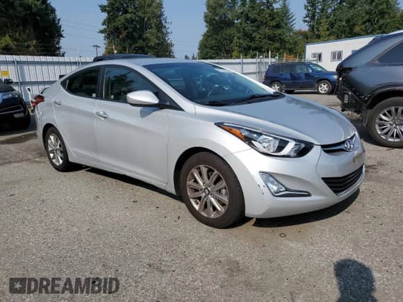 2014 Hyundai Elantra Limited with VIN KMHDH4AEXEU051416, listed as a Copart auction lot 82107055 with 77,749 mi miles and Salvage title. Bid and sale history available at DreamBid. Image 4.