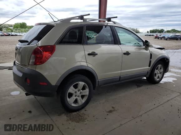 2013 Chevrolet Captiva Sport LS с VIN 3GNFL1EK4DS524565, выставлен на аукционе Copart как лот 60523174 с пробегом 159 949 миль миль и Списание • Salvage title. История ставок и продаж доступна на DreamBid. Изображение 3.