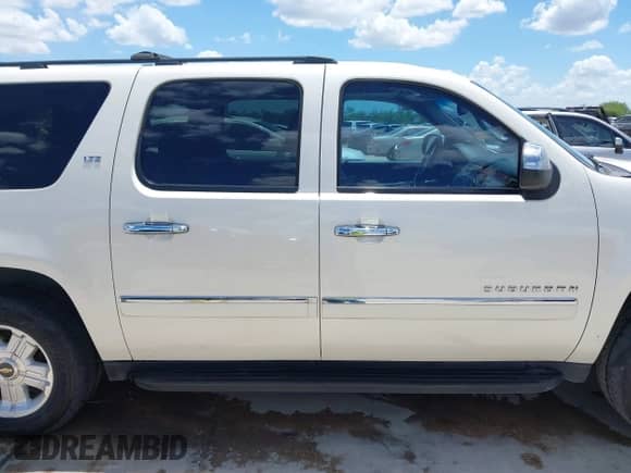 2013 Chevrolet Suburban LTZ with VIN 1GNSCKE08DR101994, listed as a IAAI auction lot 42597417 with 270,849 mi miles and . Bid and sale history available at DreamBid. Image 13.