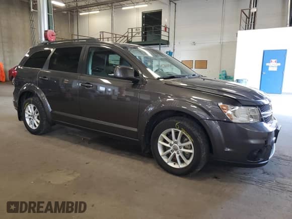 2015 Dodge Journey SXT with VIN 3C4PDDBG6FT601333, listed as a Copart auction lot 66755995 with 114,587 mi miles and Salvage title. Bid and sale history available at DreamBid. Image 4.